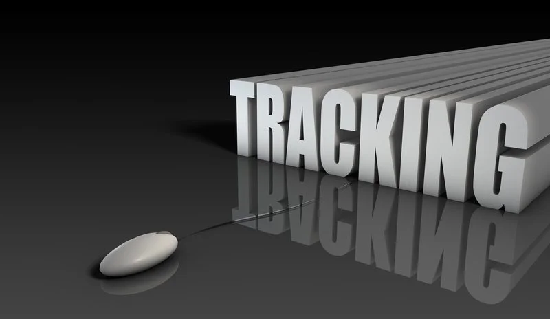 Large, receding 3D word "TRACKING" with a computer mouse connected by a wire below.